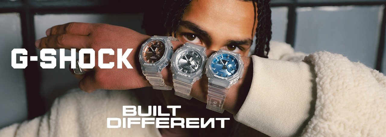 Man showing three GA-2100 watches on his wrist