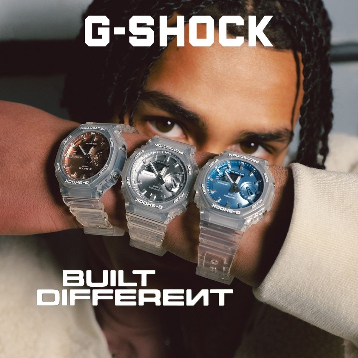 Man showing three GA-2100 watches on his wrist