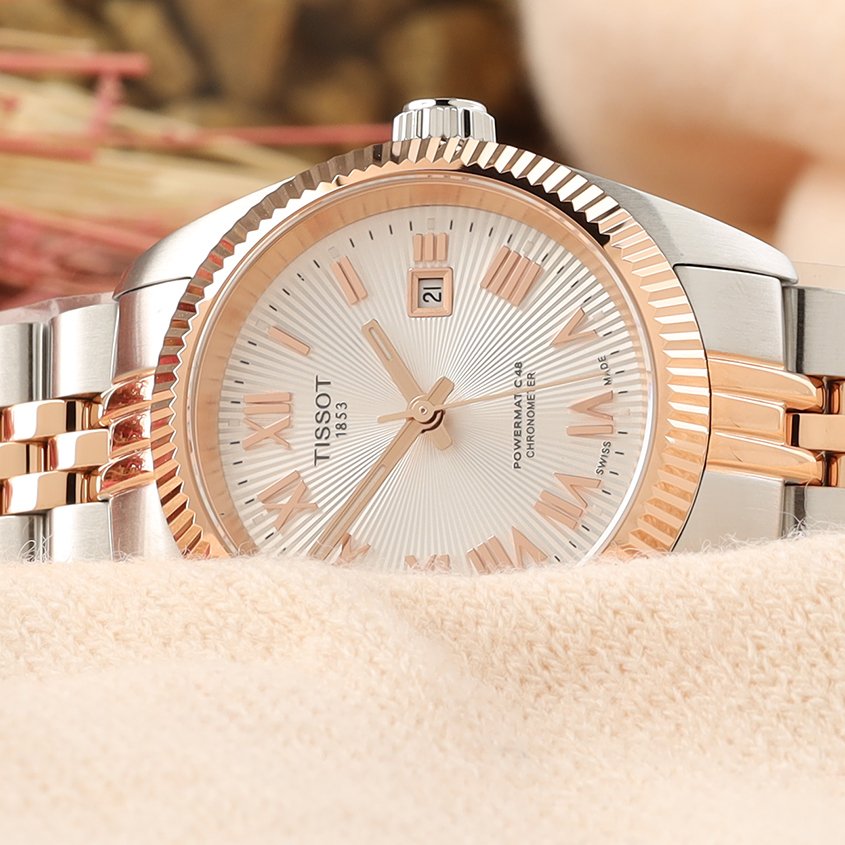 Close up of a two-tone rose gold and silver Tissot ladies watch