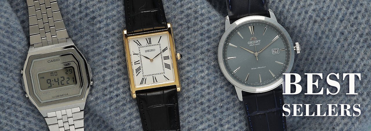 tres relojes sobre una almohada verde con el texto Best Sellers