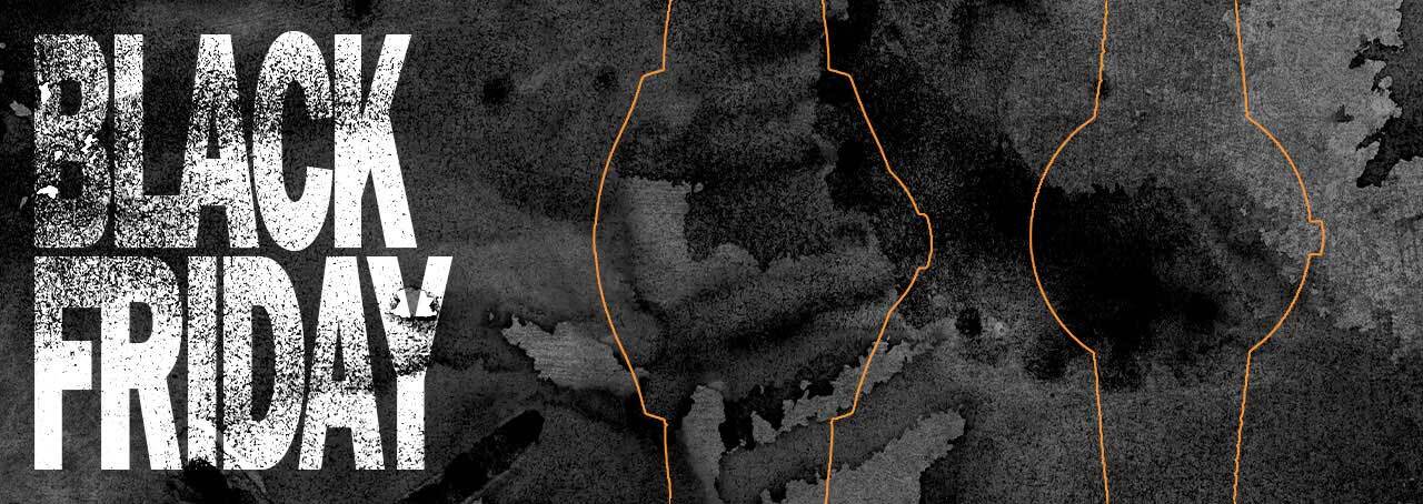 Dark ink stain pattern with the text Black Friday and the silhouette of two watches over it