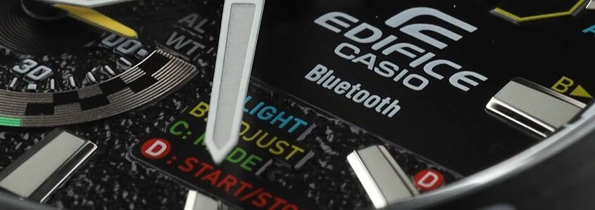 Close up of a Casio watch showing the Bluetooth logo
