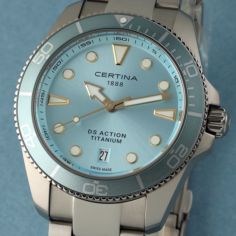 Close up of a light blue Certina dive watch