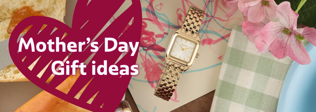 Gold Hugo Boss ladies watch on a child's drawing