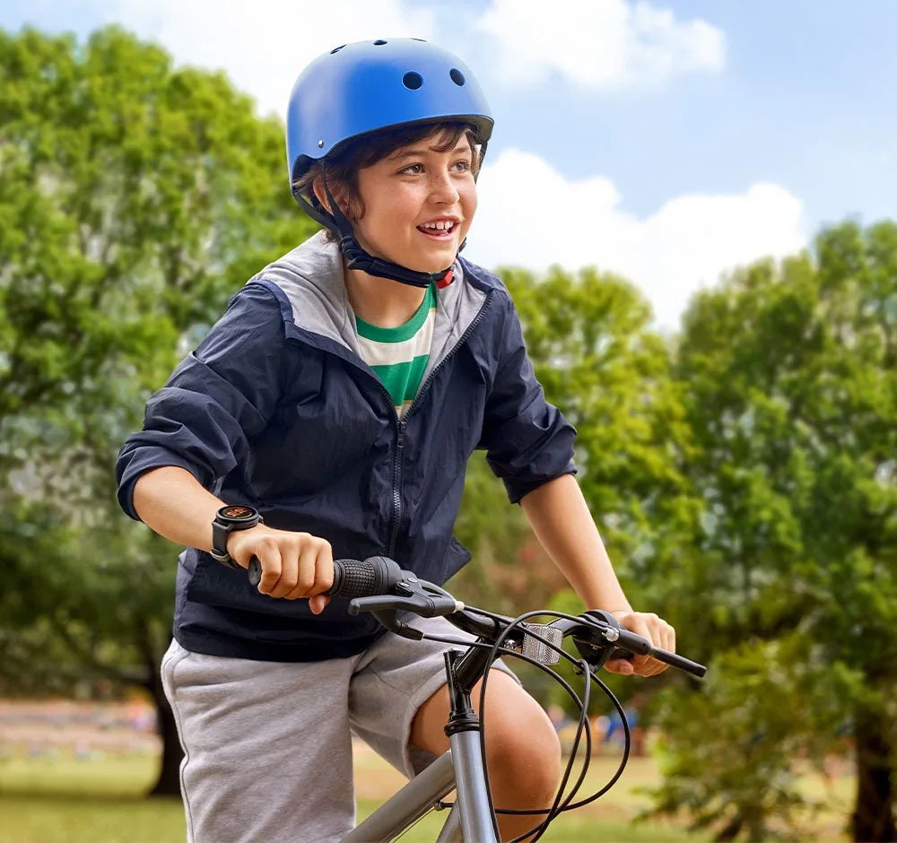Boy playing on a bicycle