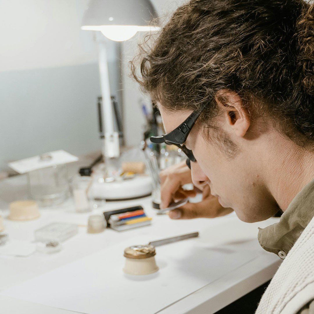 young watchmaker at work