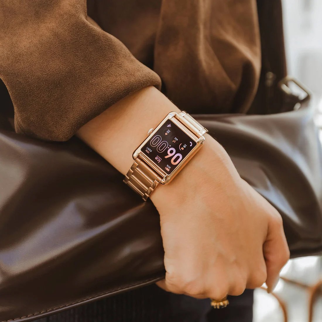 a woman's wrist wearing an Ice-watch smartwatch