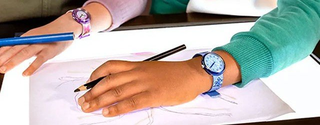 Child's wrist with a watch