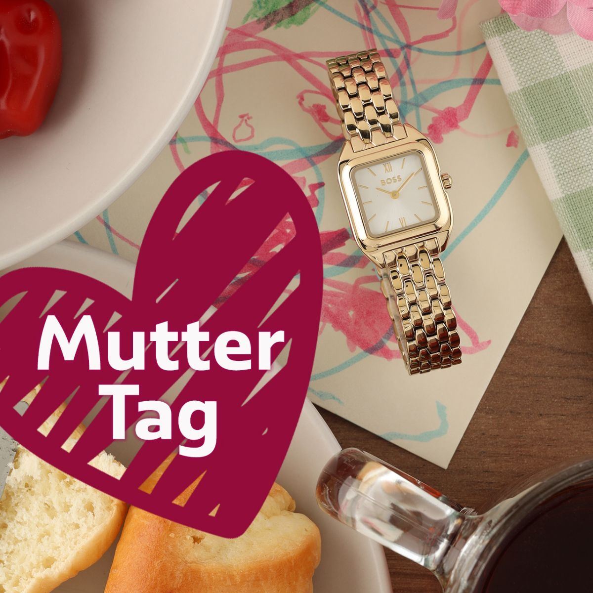 Gold Boss ladies watch on a child's drawing