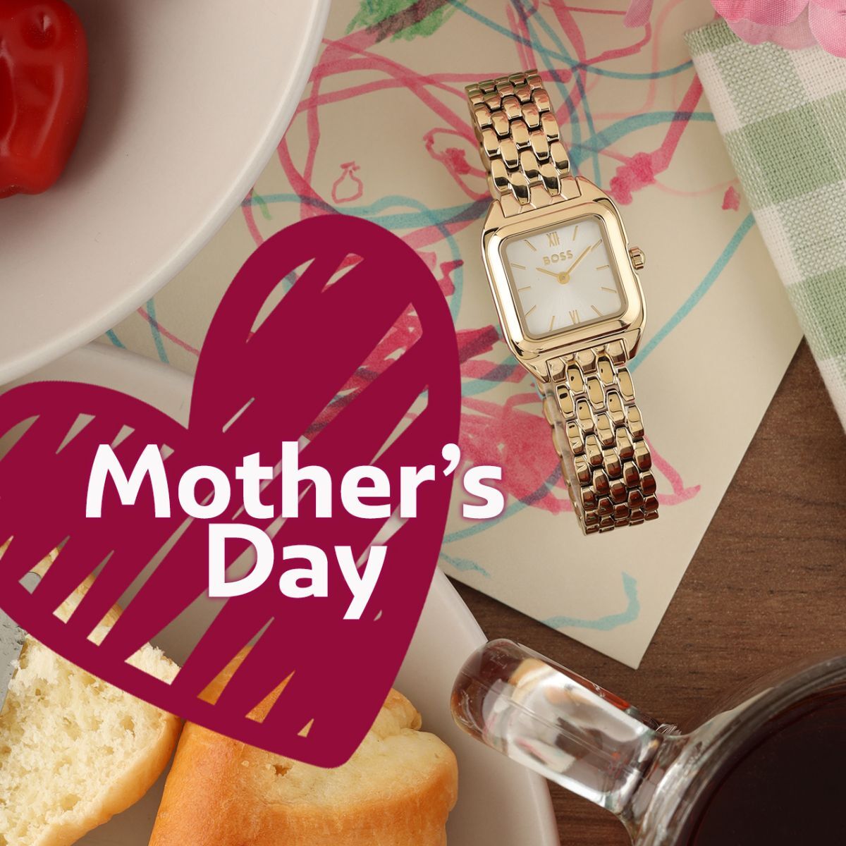 Gold Boss ladies watch on a child's drawing