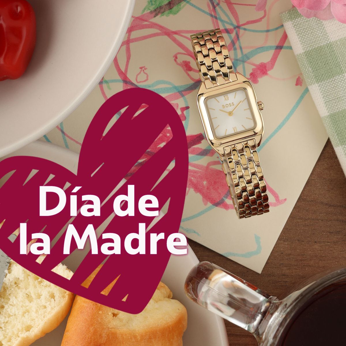 Gold Boss ladies watch on a child's drawing