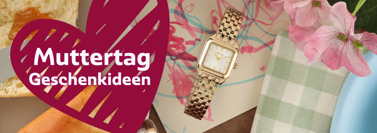 Gold Hugo Boss ladies watch on a child's drawing