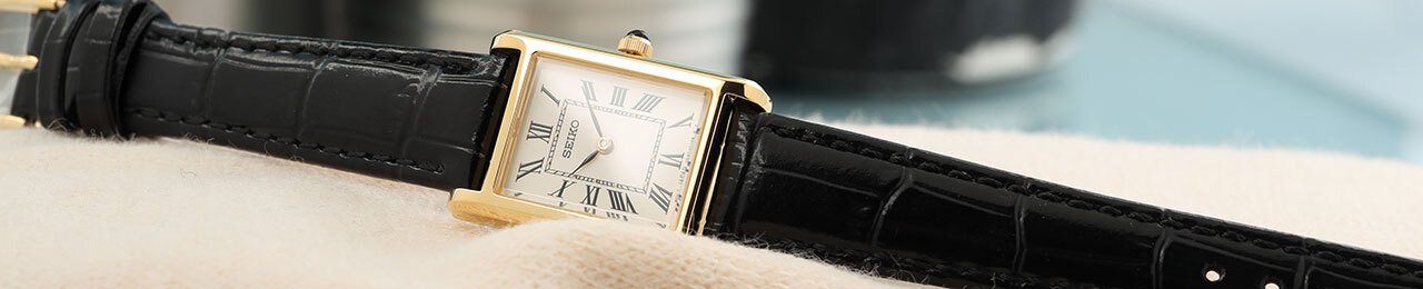 Close up of a classic tectagular seiko watch