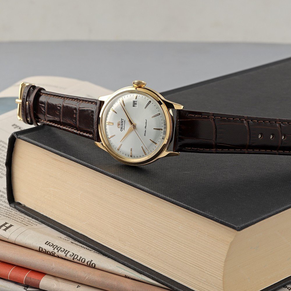 Orient watch on a book