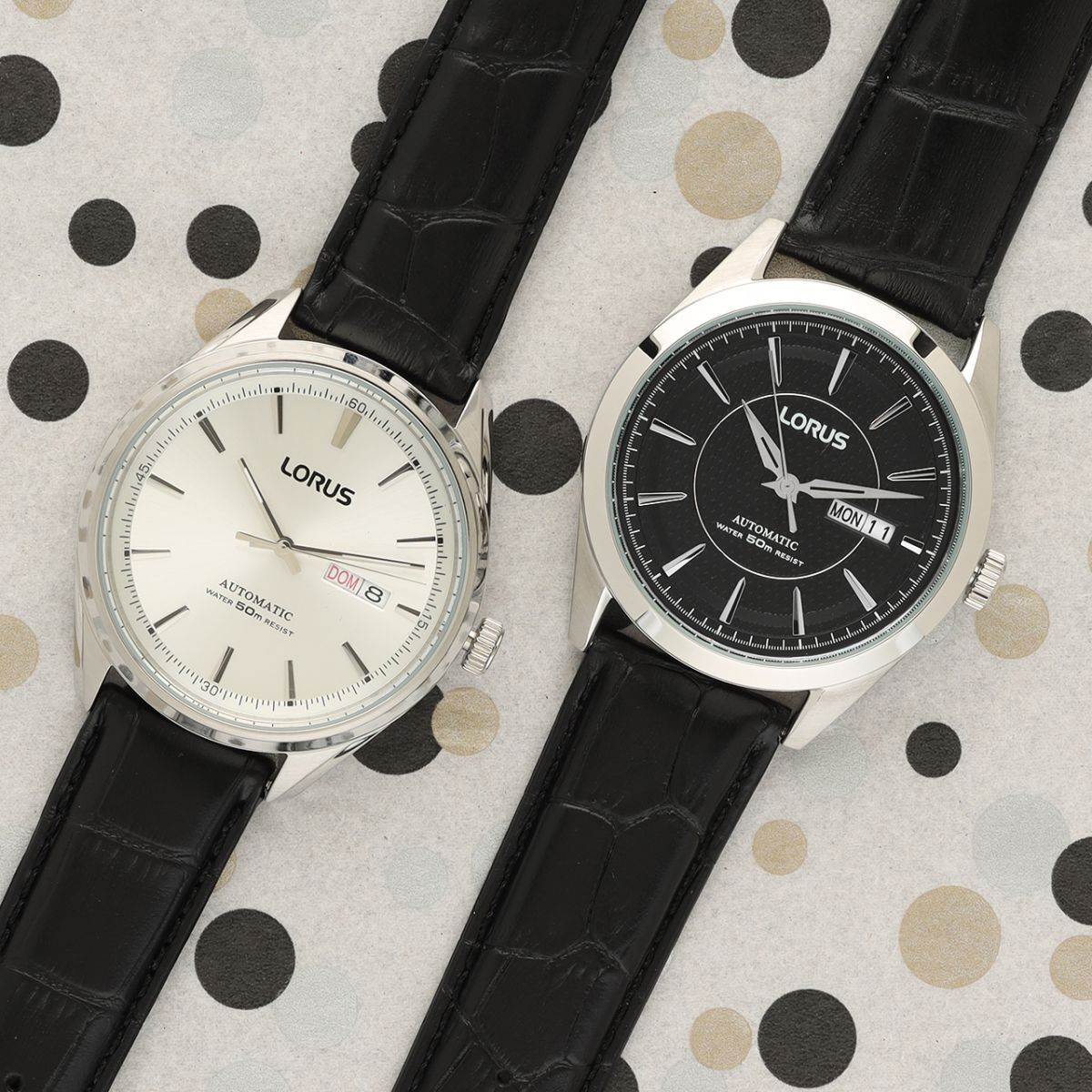 Two lorus watches on a polkadot background