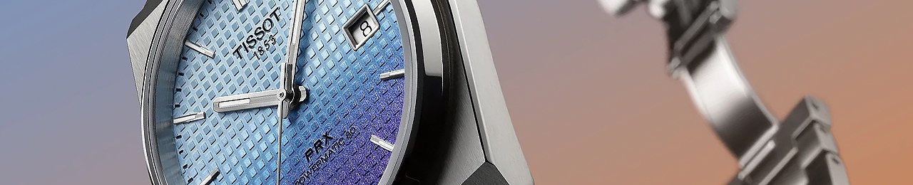 close up of a Tissot PRX watch with a blue gradient dial