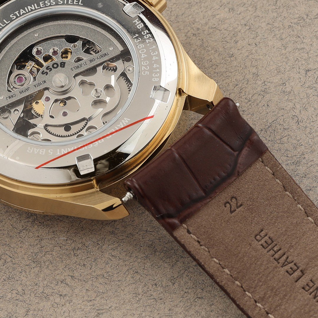back of an automatic watch with detached strap