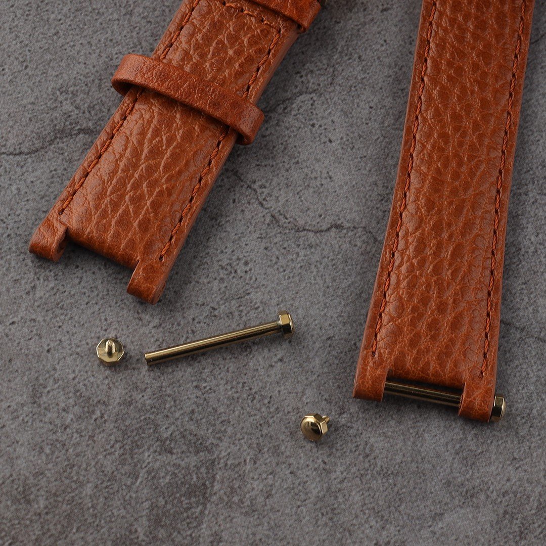 Leather strap with saddle screw