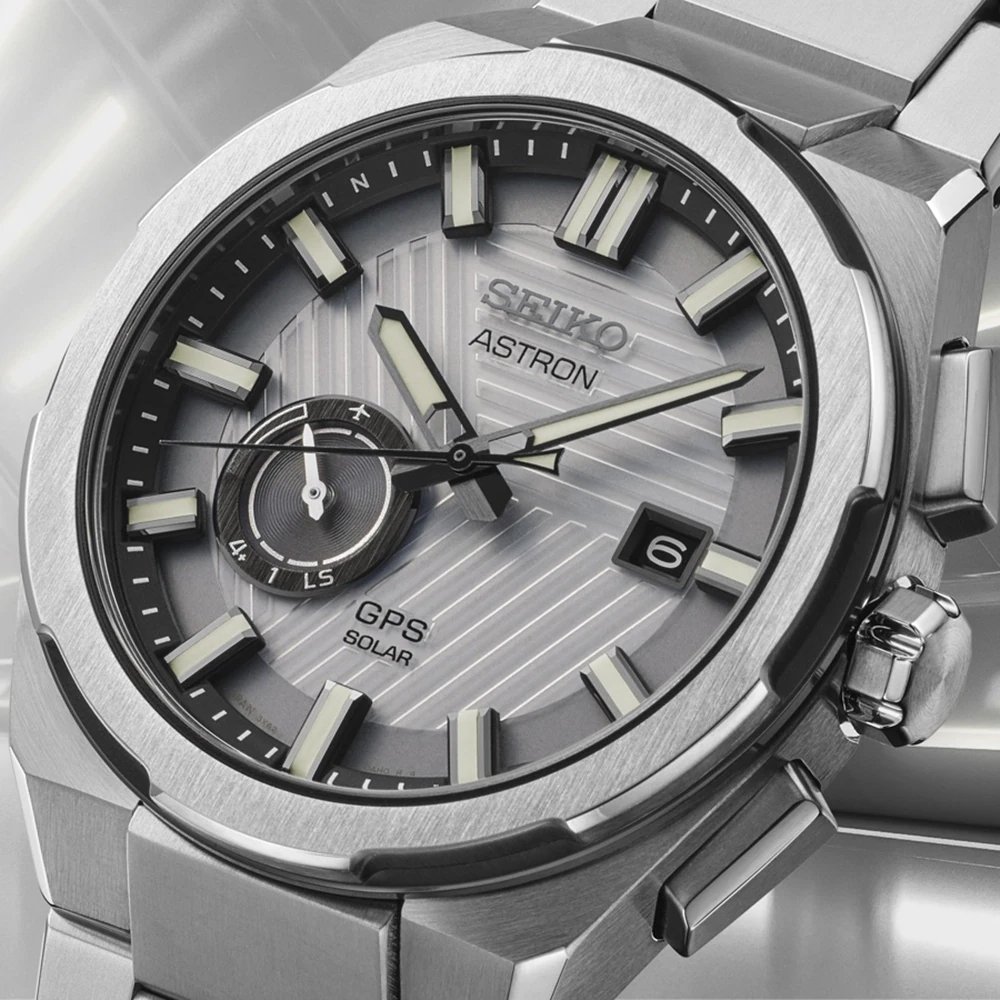 Close up of a white dial Seiko Astron watch