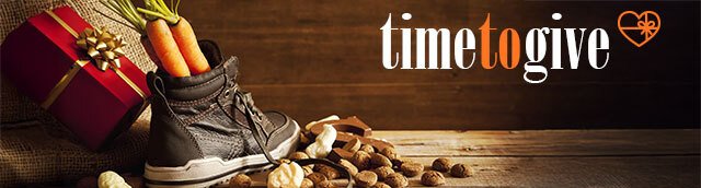 schoen met 2 wortels erin, kruidnootjes en de tekst Time to give