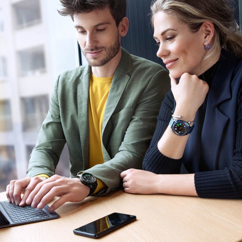 Couple wearing Samsung smartwatch