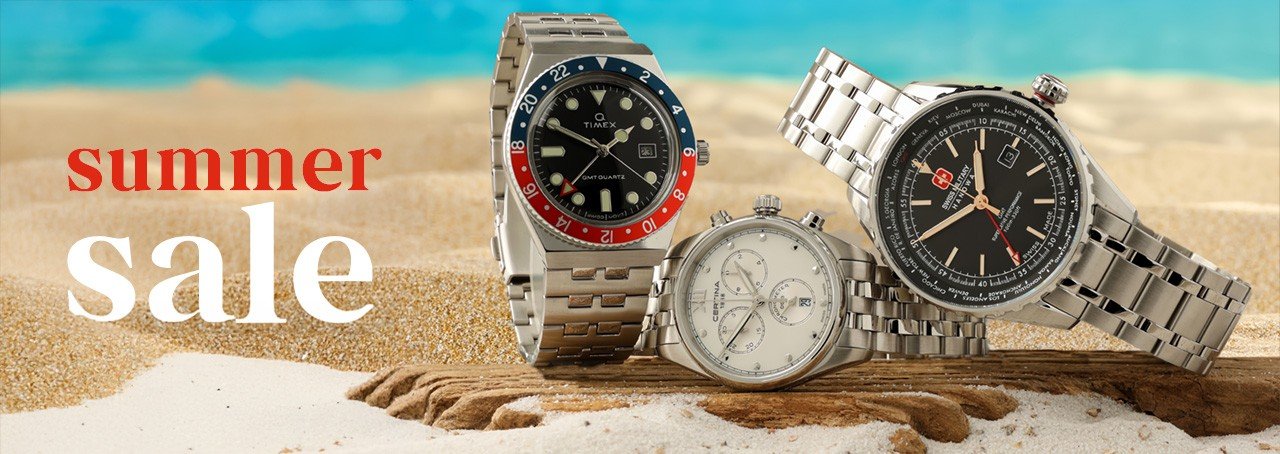 Three watches on a beach with the text Summer Sale