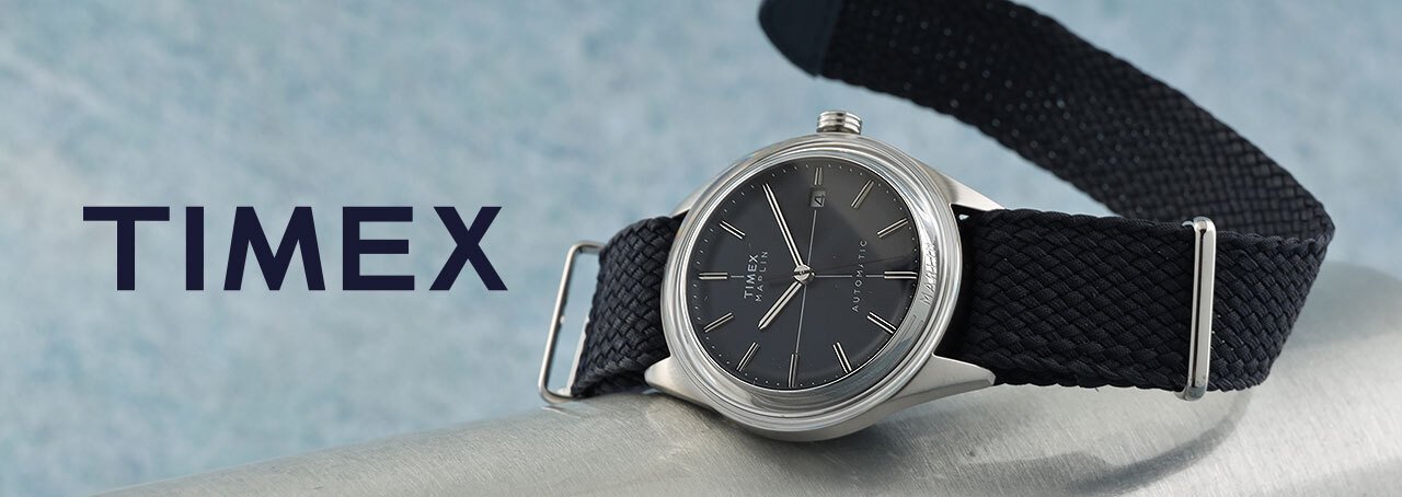 Reloj Timex bicolor oro plateado con esfera verde de fondo verde satinado