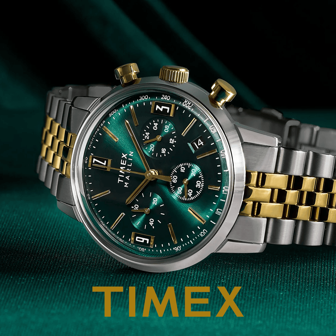 Zweifarbige Timex-Uhr auf grünem Hintergrund