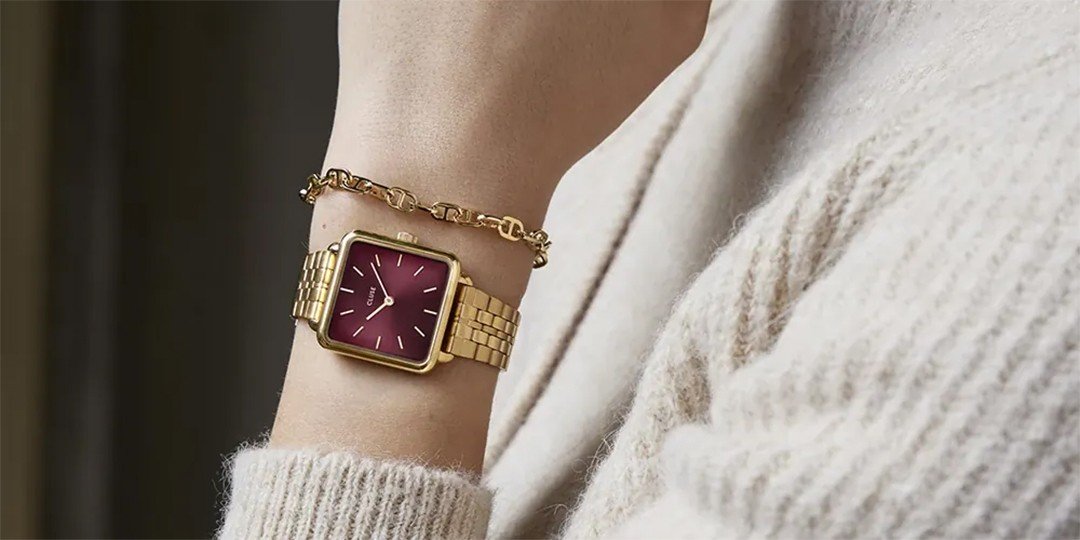 Quadratische Cluse-Uhr in Gold-Rot
