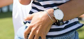 Man's wrist with a simple watch